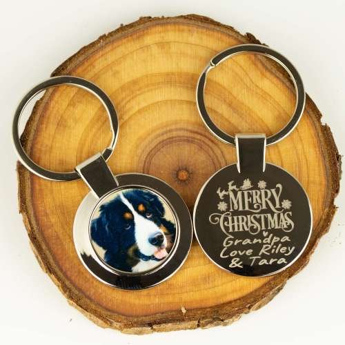 Personalised stainless steel round keyring for Christmas, featuring a custom printed photo and an engraved message.